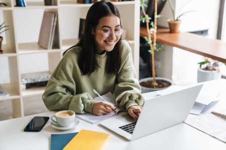 girl typing on computer