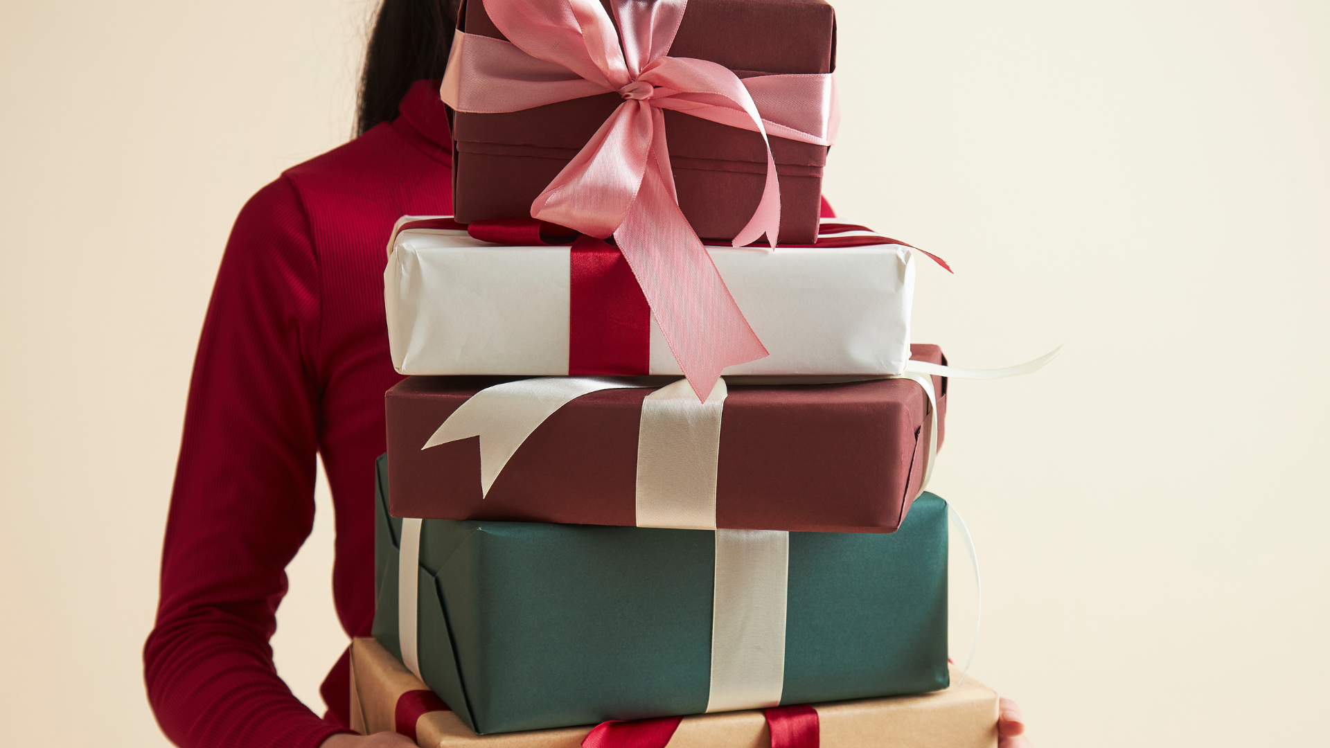 girl holding gifts